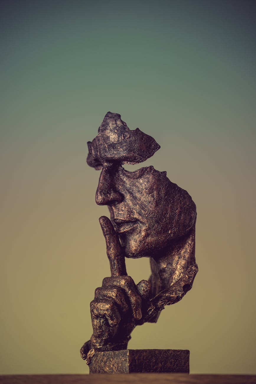 abstract bronze sculpture with missing parts
