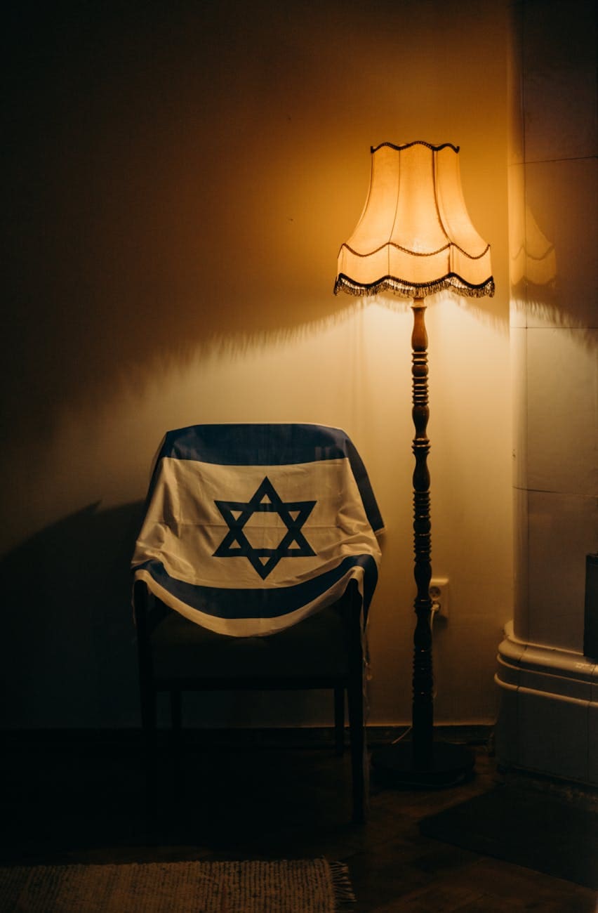 flag of israel over a chair